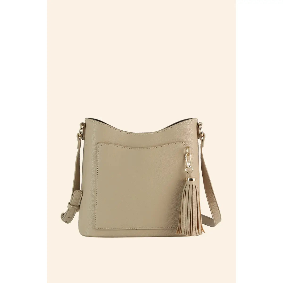 Tassel Charm Pebbled Crossbody Bag