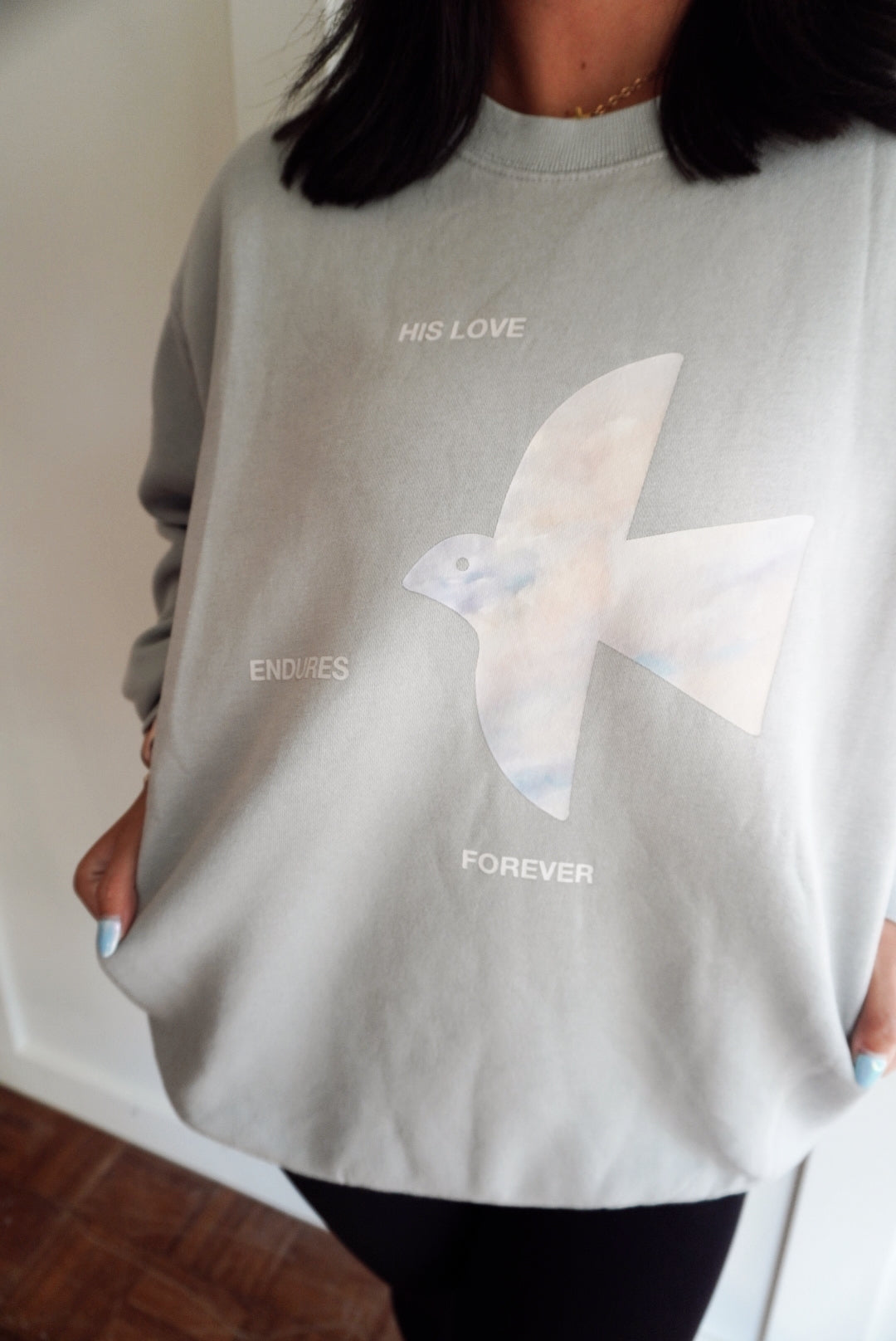 His love endures forever crewneck