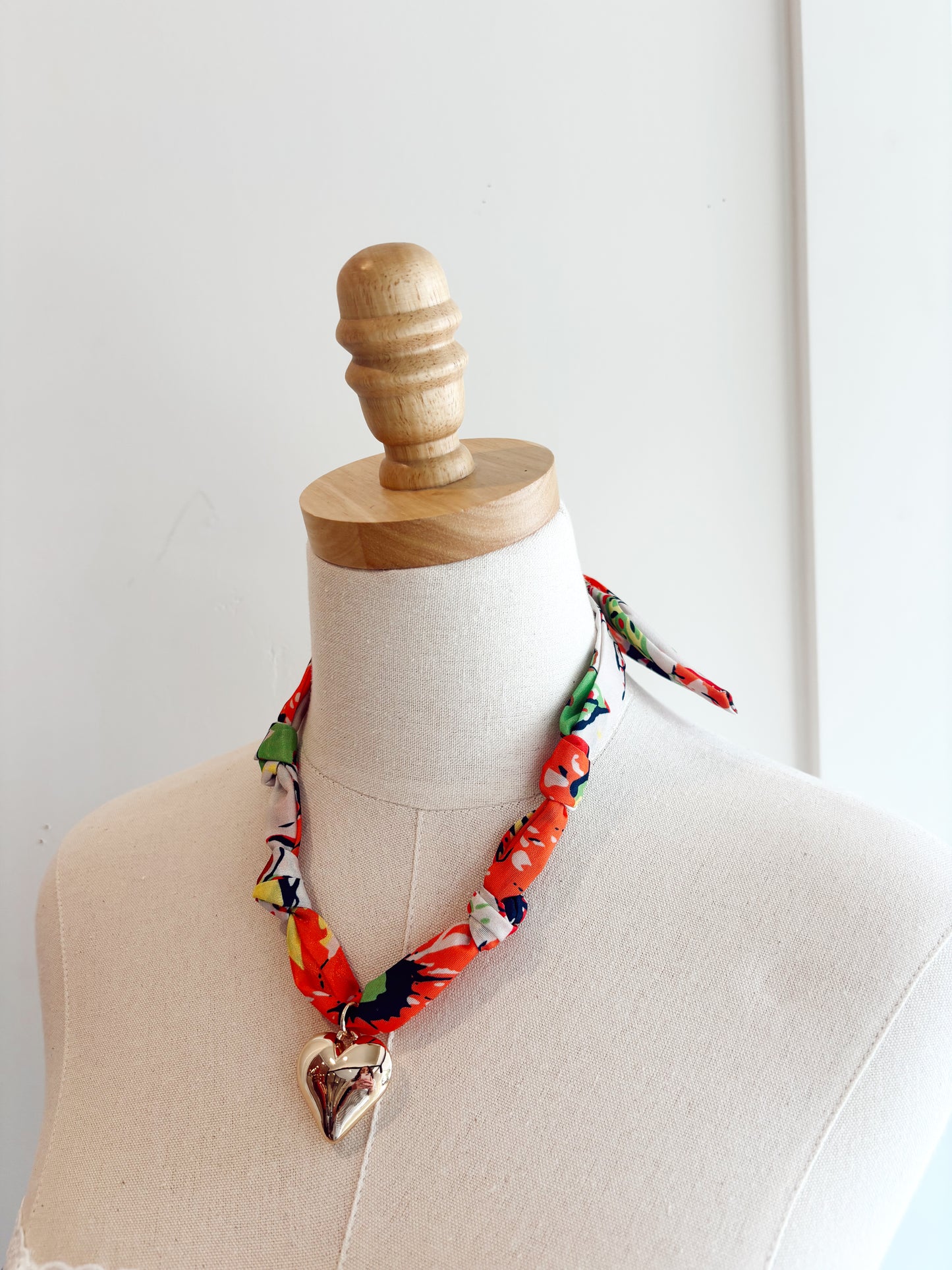 Chunky heart charm orange scarf necklace