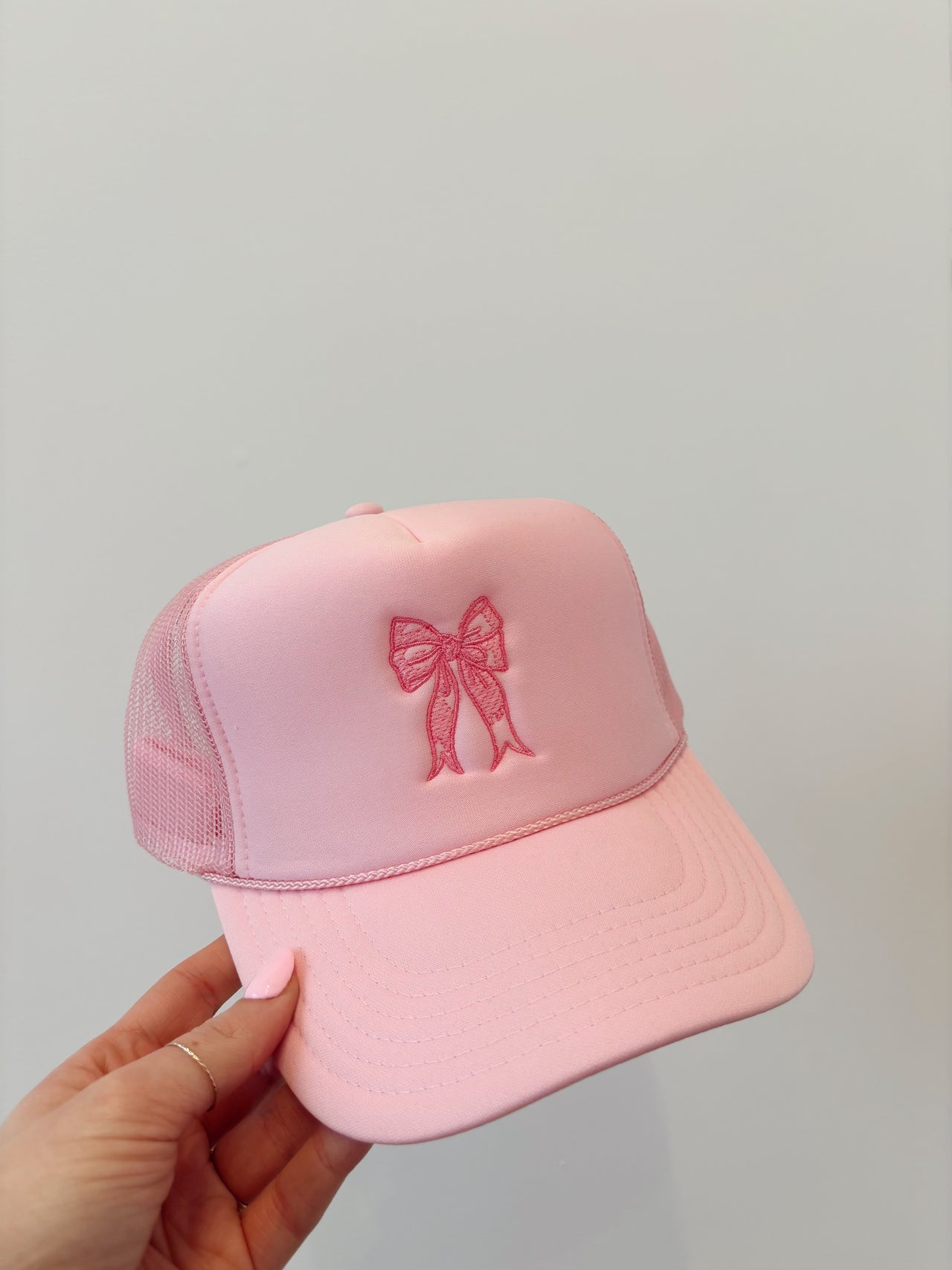 pink bow trucker hat