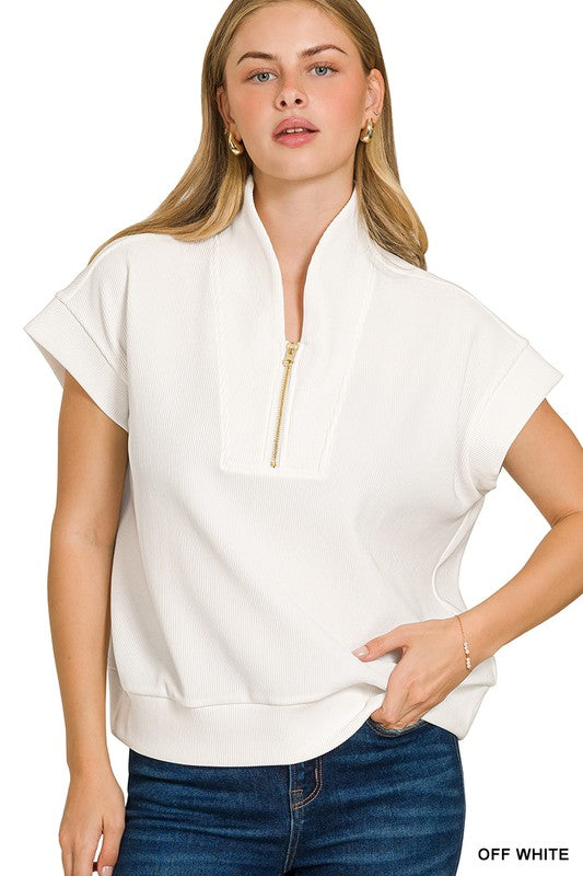 Ribbed high neck half zip top
