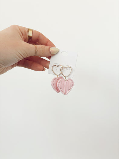 light pink woven heart earrings