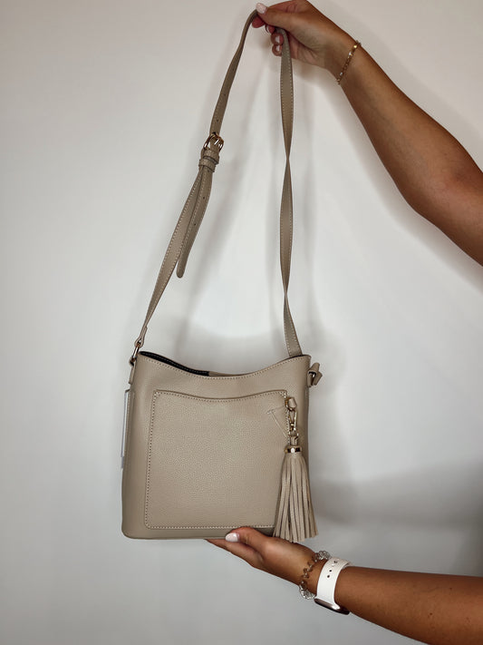 Tassel Charm Pebbled Crossbody Bag