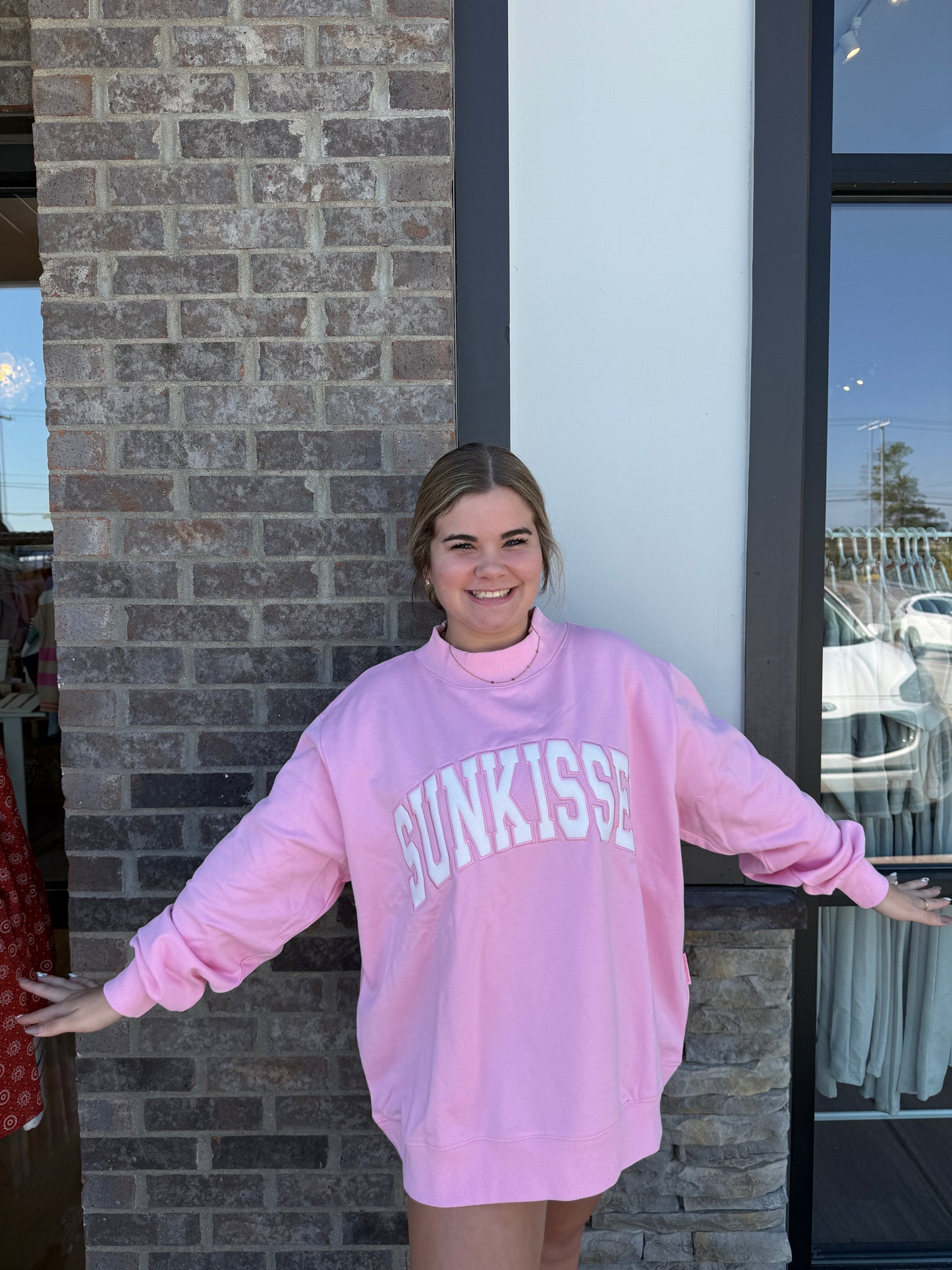 Lottie Pink Varsity Sunkissed
Embroidered Mockneck Sweatshirt