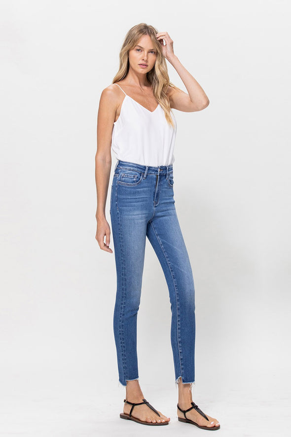 High rise raw step hem ankle skinny