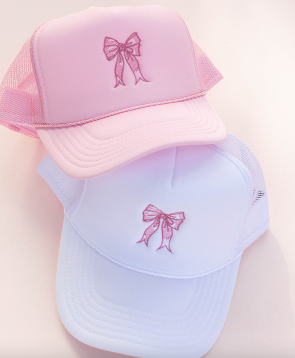 white bow trucker hat