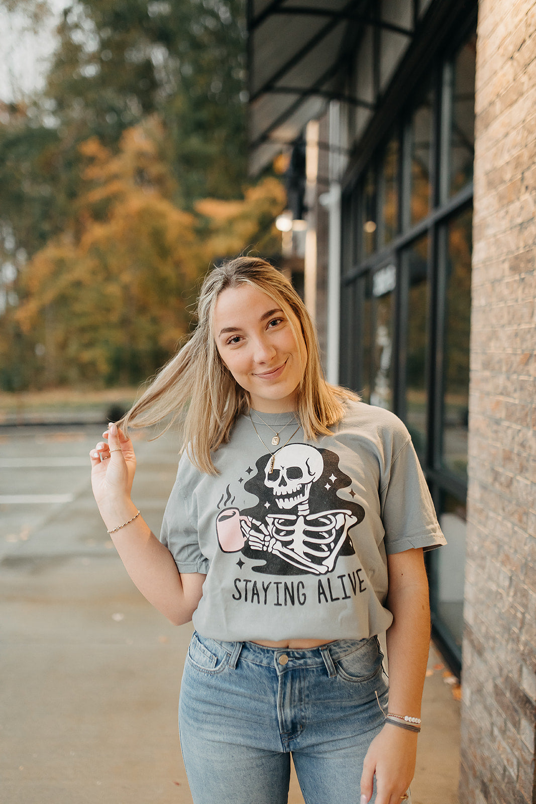 staying alive tee