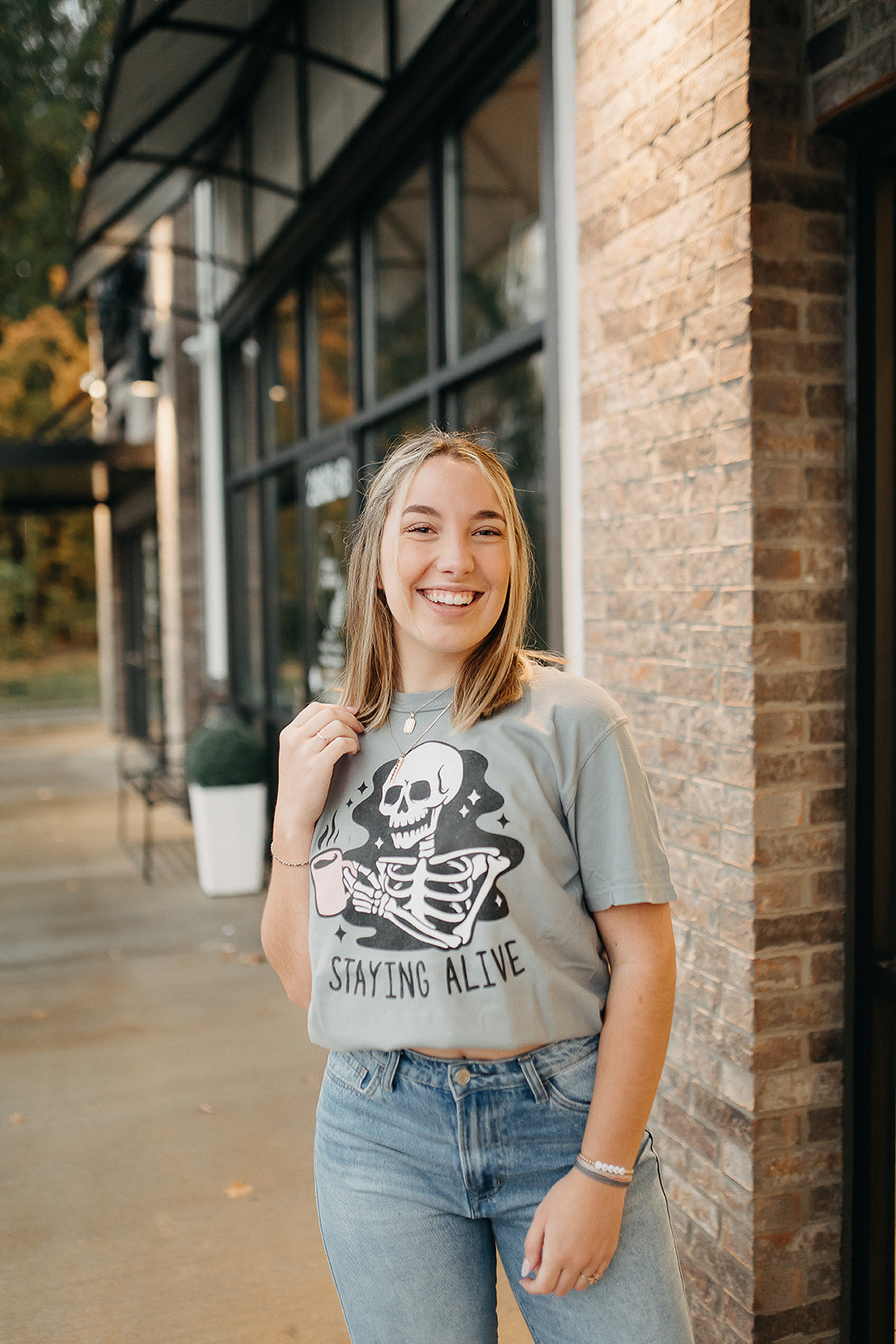 staying alive tee