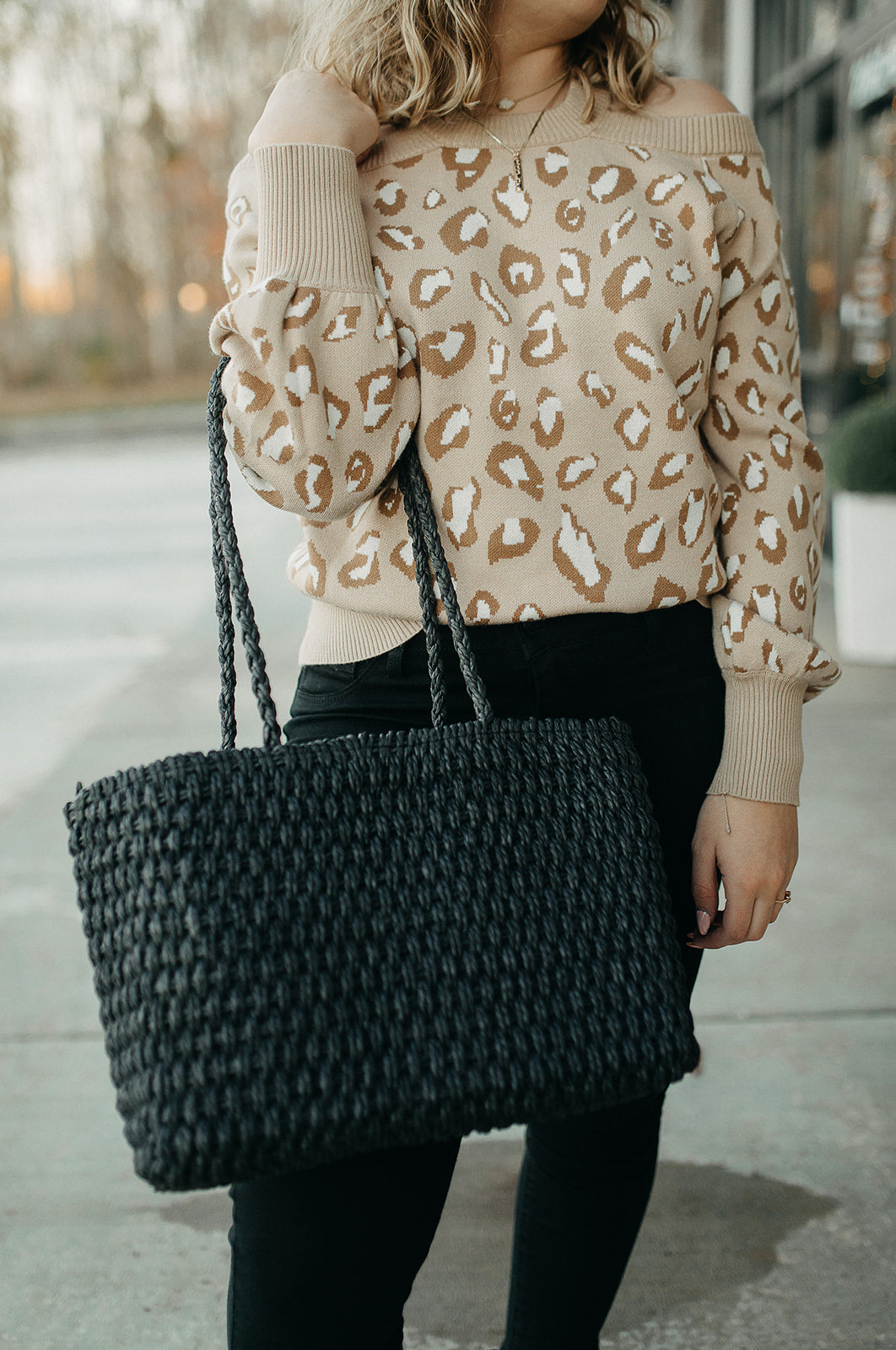 black woven tote