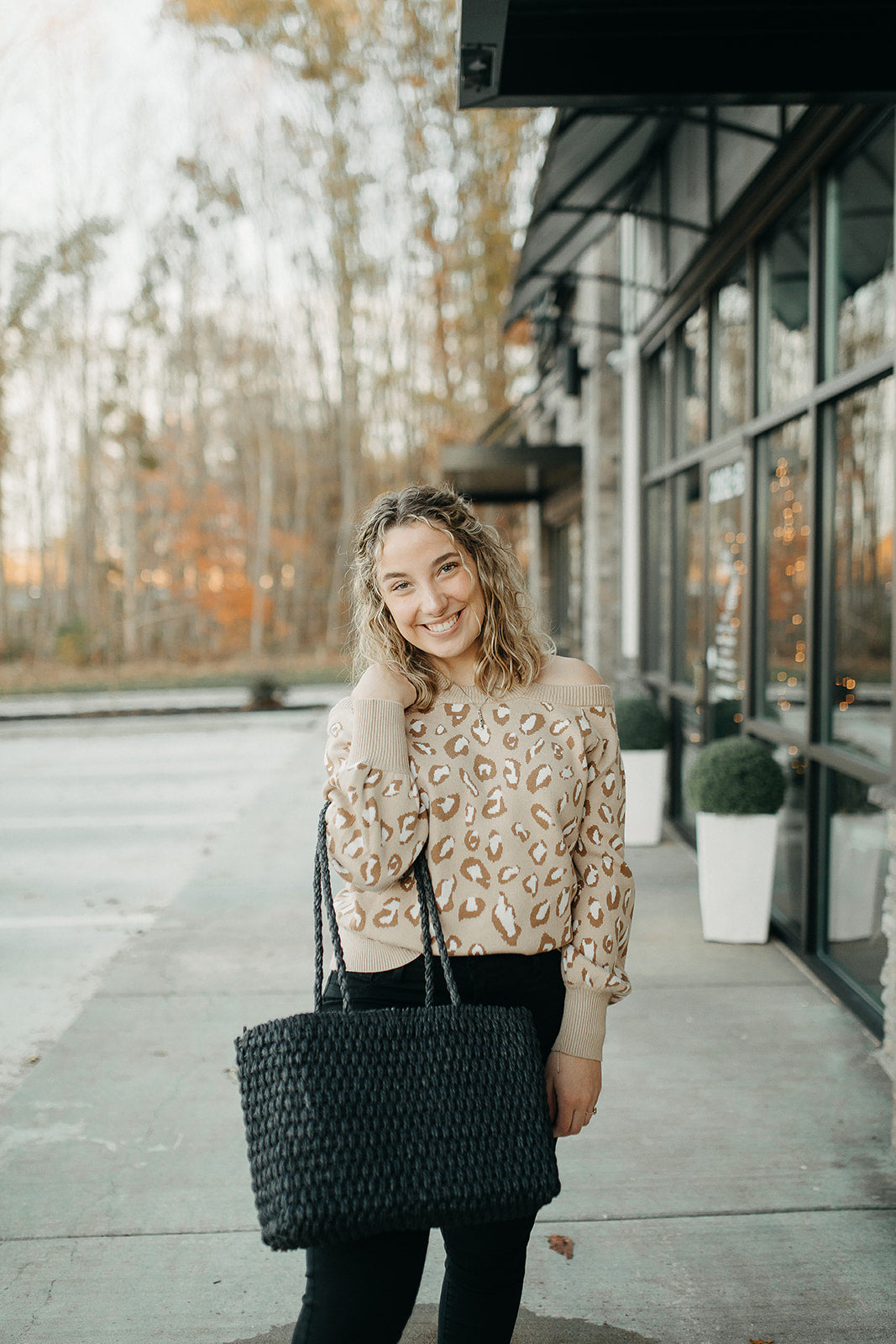 black woven tote