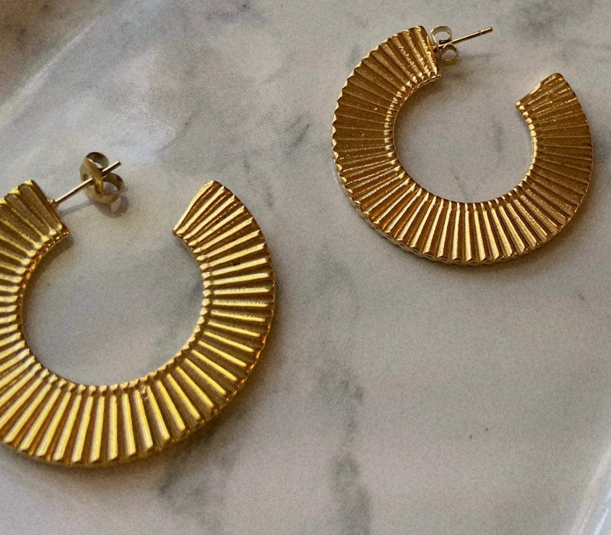 st Augustine earrings