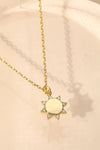 sun disk necklace